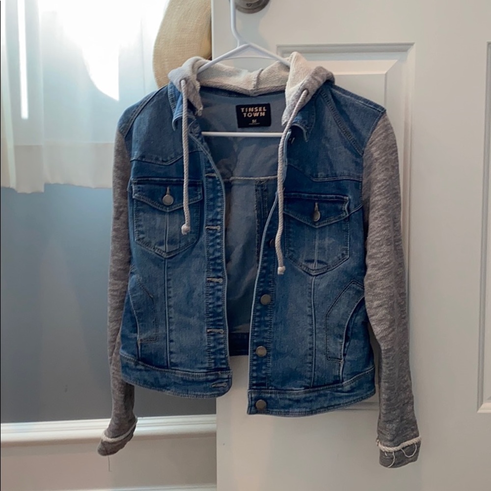 Denim jacket with sweater sleeves